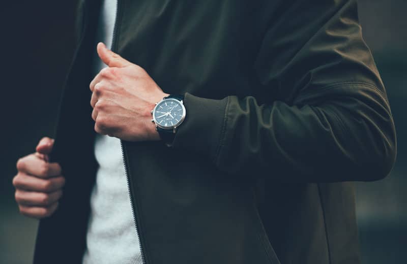 Accessories like a watch can add personality to a men's wardrobe